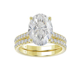 14K YELLOW GOLD 4 1/2CT ROUND/OVAL DIAMOND LADIES BRIDAL SET (CENTER STONE OVAL DIAMOND 4CT)