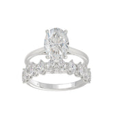 14K WHITE GOLD 4 1/2CT ROUND/OVAL DIAMOND LADIES BRIDAL SET (CENTER STONE OVAL DIAMOND 3.00CT)