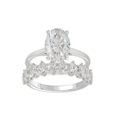 14K WHITE GOLD 4 1/2CT ROUND/OVAL DIAMOND LADIES BRIDAL SET (CENTER STONE OVAL DIAMOND 3.00CT)
