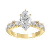 14K YELLOW GOLD 2 3/4CT ROUND/MARQUISE DIAMOND LADIES RING (CENTER STONE MARQUISE DIAMOND 2CT)