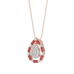 Elegant 14K Rose Gold Ladies Pendant Featuring Ruby And Diamond Accents With Round And Baguette Cut 0.50 Ct. Includes Chain For A Complete Look.