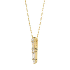 10K Yellow Gold 0.10Ct Diamond Pendant With Chain Featuring Round And Baguette Accents. A Simple Yet Sophisticated Ladies Fine Jewelry Piece.
